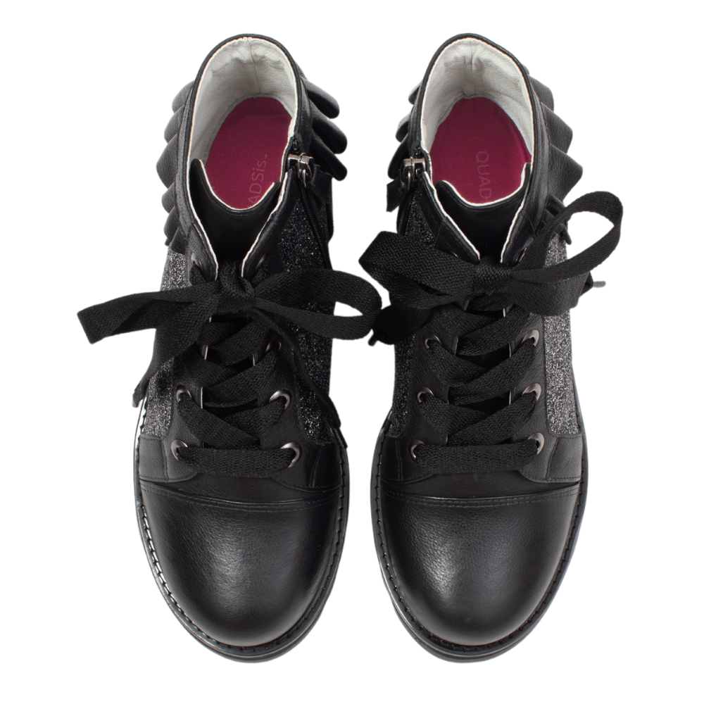 QUADSis Brooke Boot Silver. Comfortable, sustainable, lightweight, low heel, lug sole boot with working laces and side entry zipper and ruffle collar. Genuine leather with graffiti print and black silver glitter.