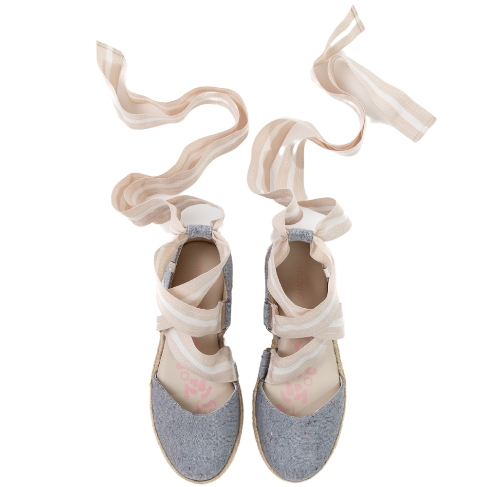 QUADSis Elaine Too Espadrille Wedge Chambray. Comfortable, sustainable, low heel wedge with adjustable grosgrain ribbon and jute wrap. Canvas. Chambray and green apple.