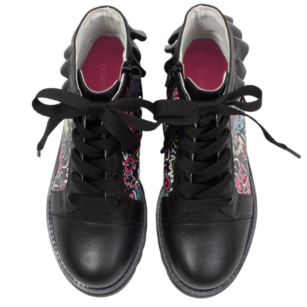 QUADSis Brooke Boot Graffiti. Comfortable, sustainable, lightweight, low heel, lug sole boot with working laces and side entry zipper and ruffle collar. Genuine leather with graffiti print and black silver glitter.