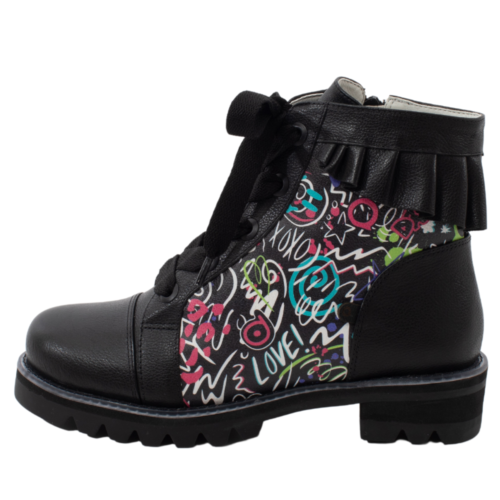 QUADSis Brooke Boot Graffiti. Comfortable, sustainable, lightweight, low heel, lug sole boot with working laces and side entry zipper and ruffle collar. Genuine leather with graffiti print and black silver glitter.