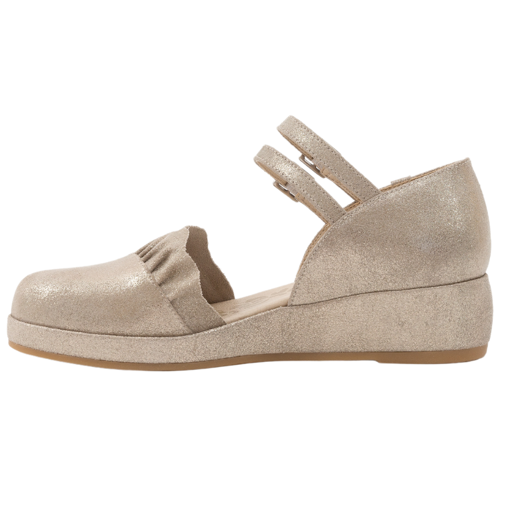 QUADSis Elizabeth Mary Janes Gilver.  Comfortable, sustainable, low heel wedge with adjustable double strap.  Denim, genuine leather, and patent materials with cork & leather midsole. Shimmer suede.