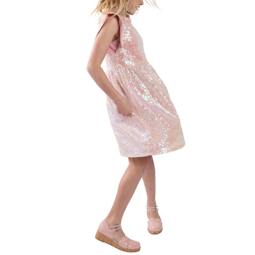 QUADSis Elizabeth Mary Janes Bubble Gum pink.  Comfortable, sustainable, low heel wedge with adjustable double strap.  Denim, genuine leather, and patent materials with cork midsole.