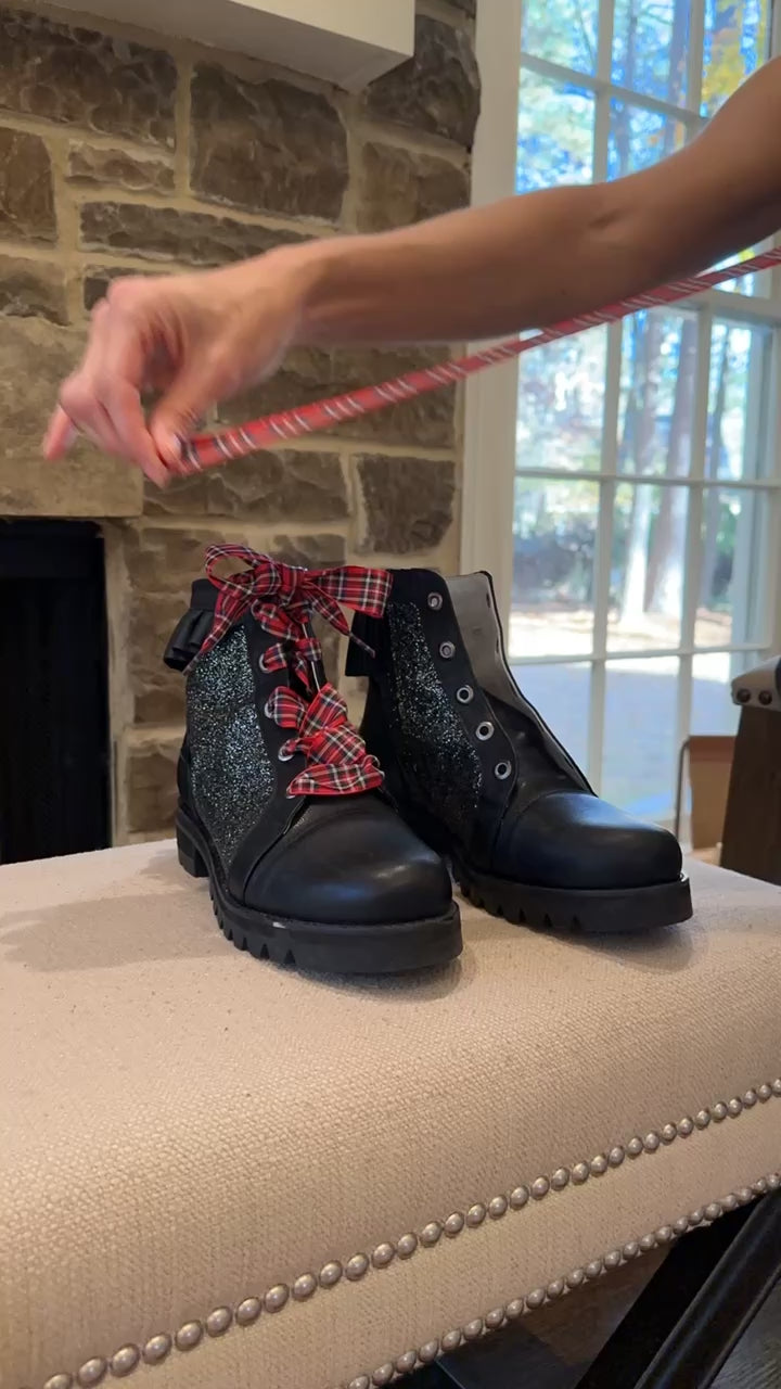 QUADSis Brooke Boot Lace Tying Tutorial. Comfortable, sustainable, lightweight, low heel, lug sole boot with working laces and side entry zipper. Genuine leather with graffiti print and black silver glitter.