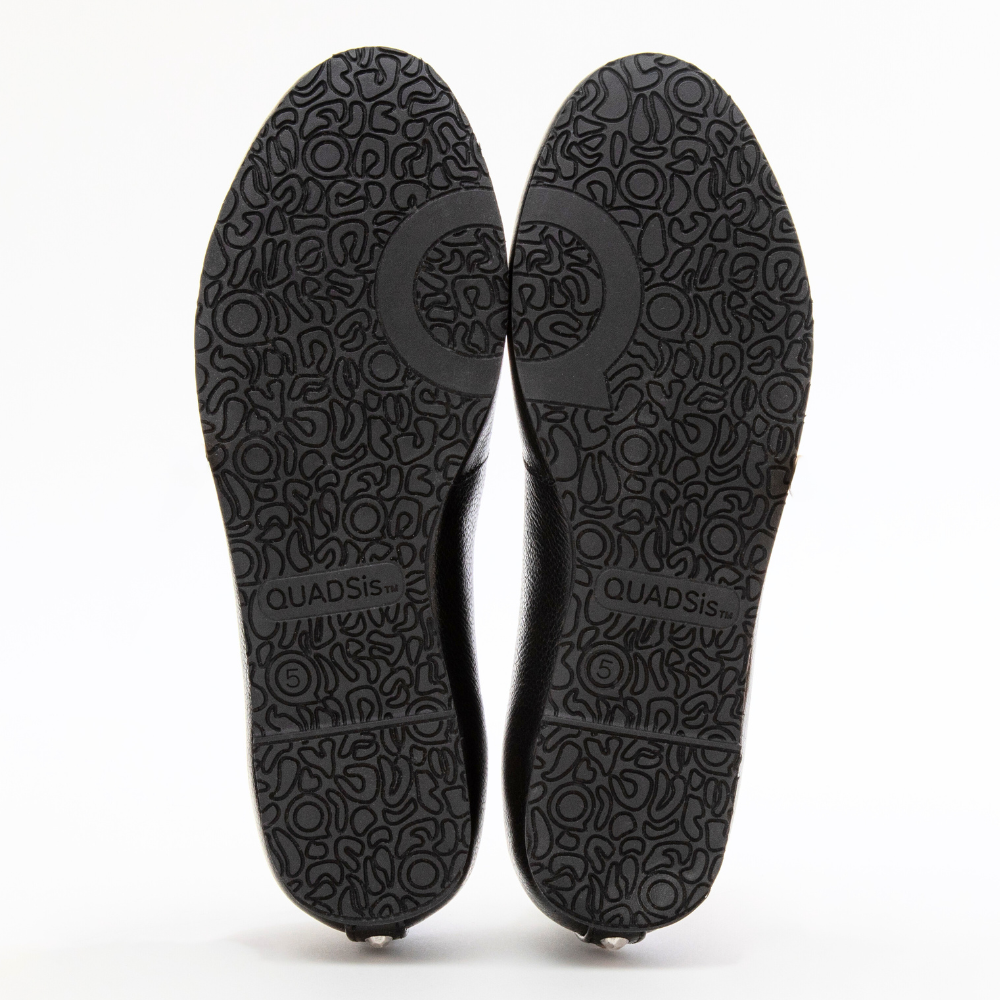 QUADSis Ballet flat Black. Comfortable, sustainable, and lightweight with removeable leather tie. Genuine leather in black and soft gold.