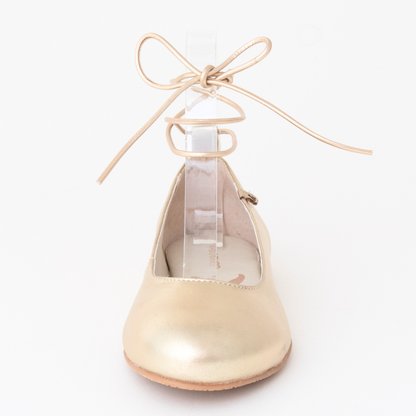 QUADSis Ballet flat Gold. Comfortable, sustainable, and lightweight with removeable leather tie. Genuine leather in black and soft gold.