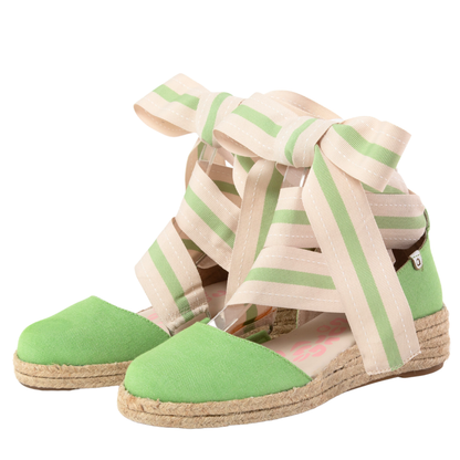 QUADSis Elaine Too Espadrille Wedge Green Apple. Comfortable, sustainable, low heel wedge with adjustable grosgrain ribbon and jute wrap. Canvas. Chambray and green apple.