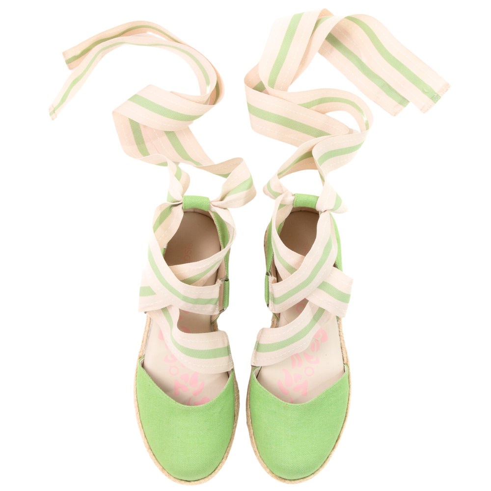 QUADSis Elaine Too Espadrille Wedge Green Apple. Comfortable, sustainable, low heel wedge with adjustable grosgrain ribbon and jute wrap. Canvas. Chambray and green apple.